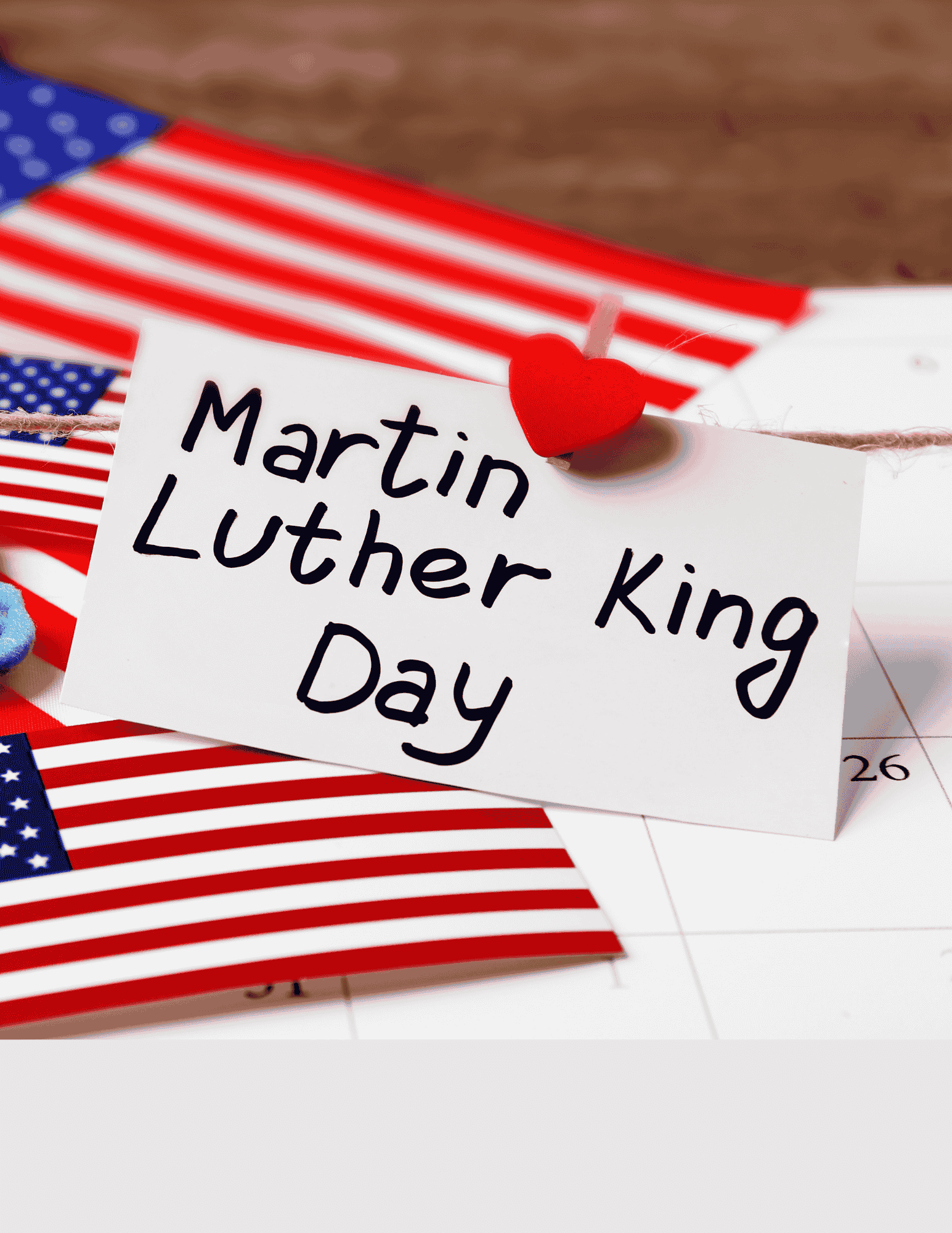 Photo of a Calendar with a sign that says Martin Luther King Day