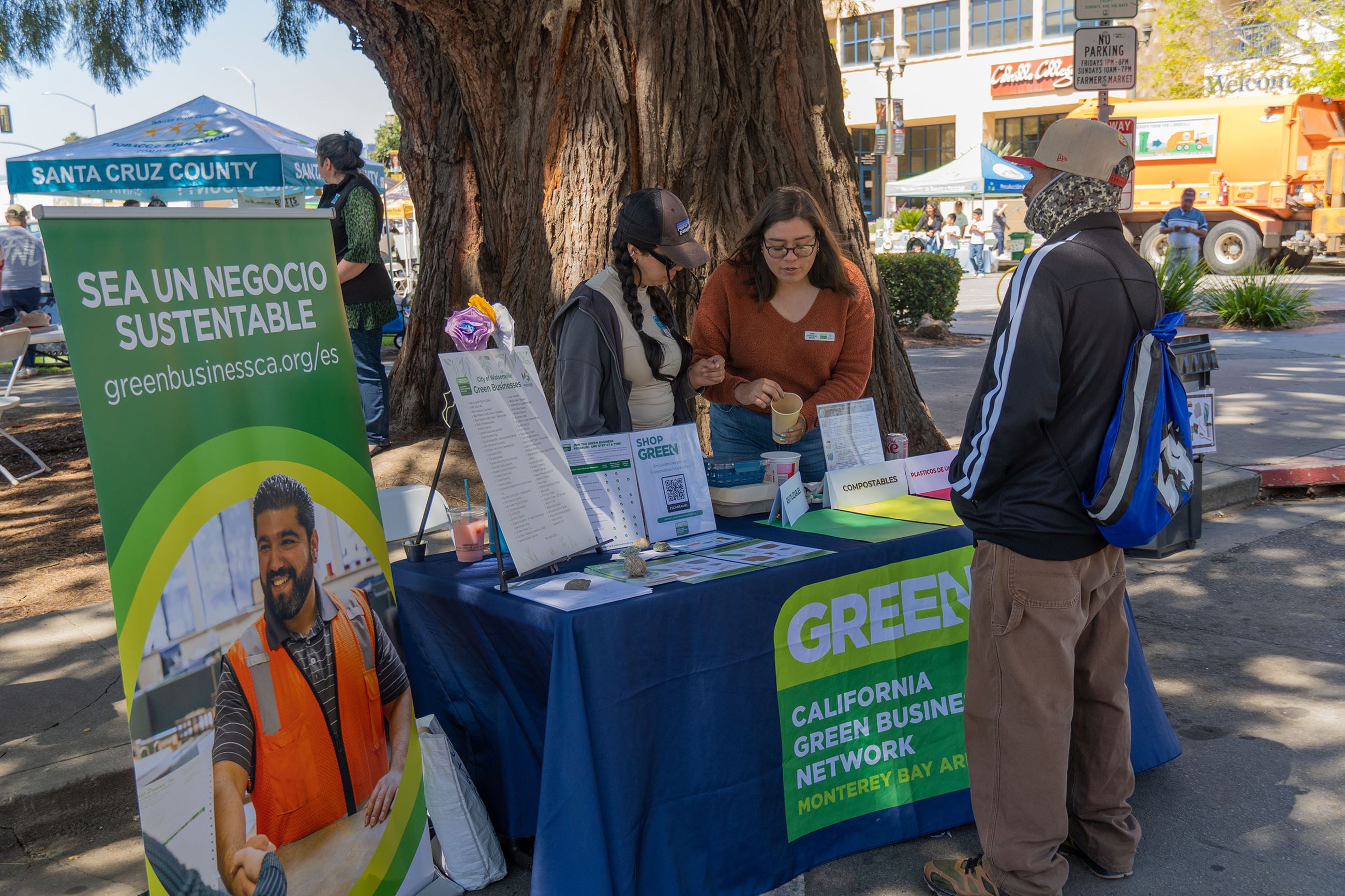 Employees of the California Green Business Network doing community outreach at Earth Day