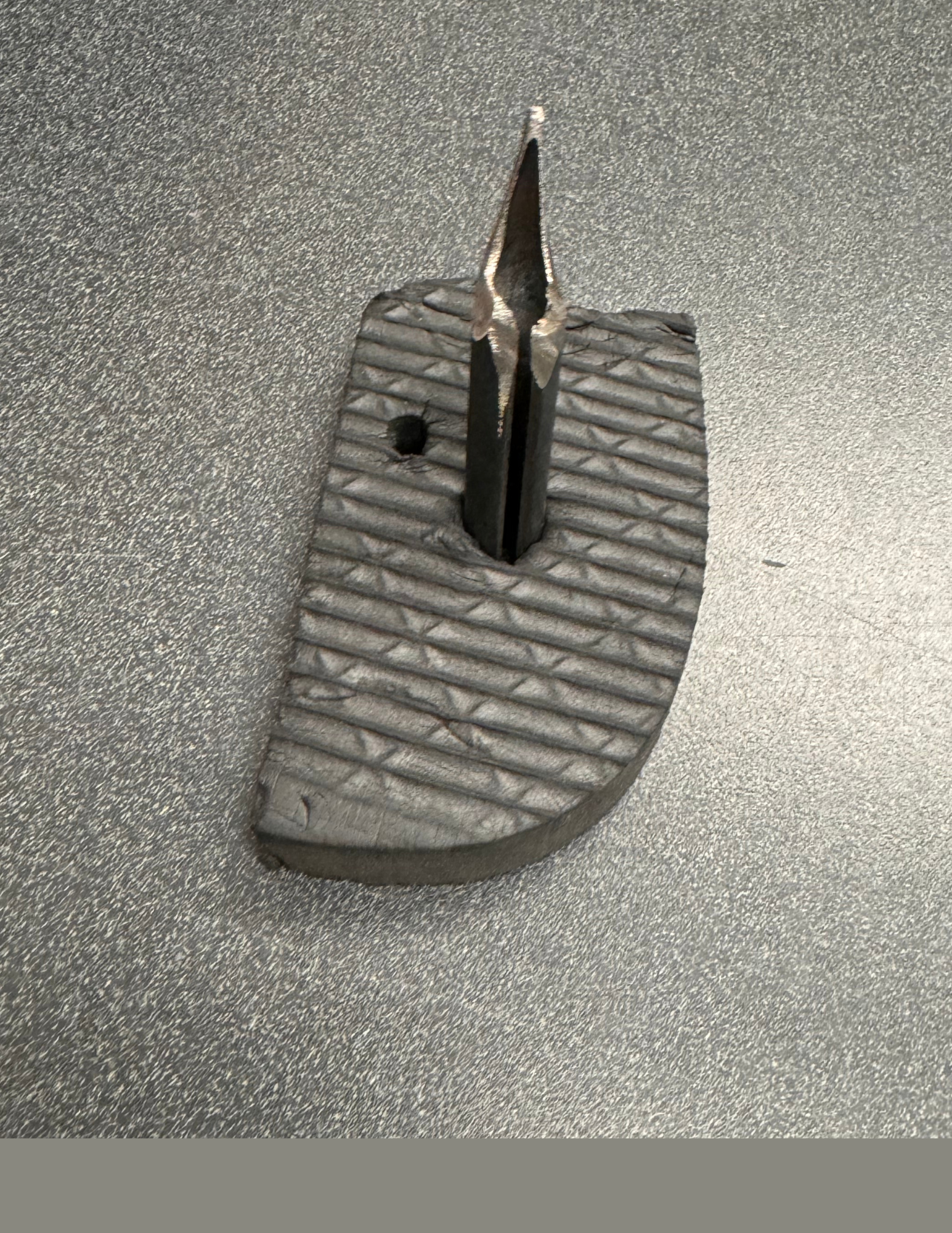 Photo of sharp object used by thieves to make tire flat  