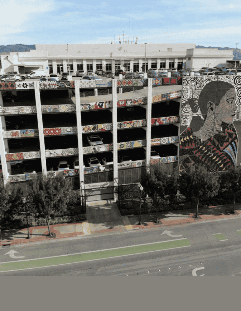 City employees and partners posing for a photo with award they won 
