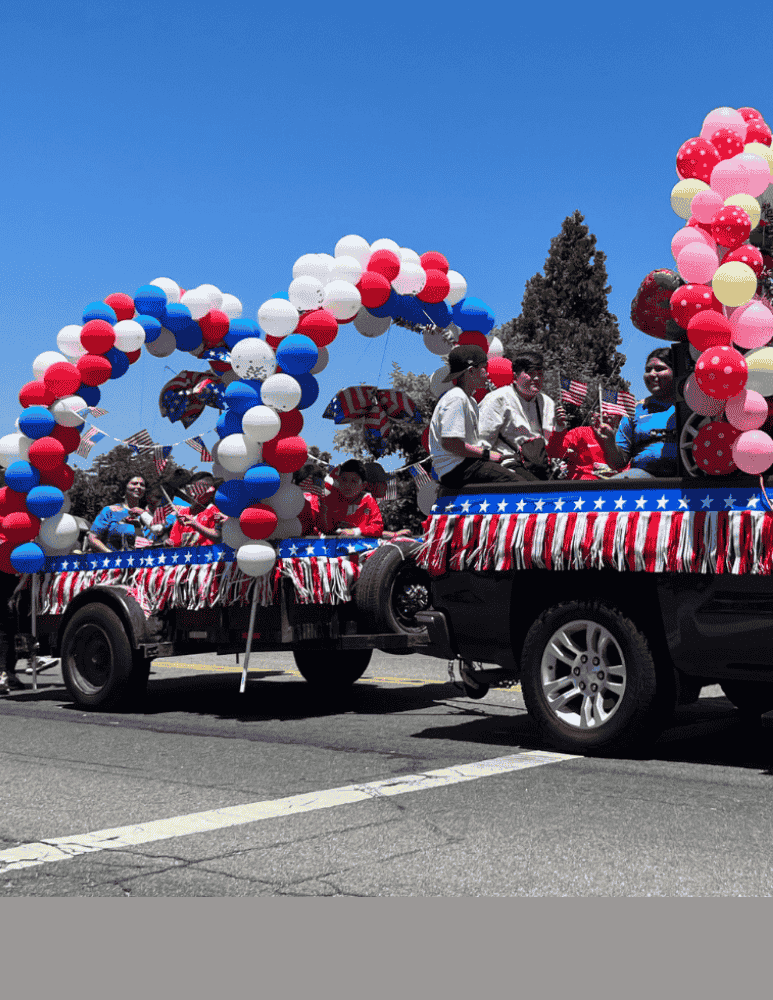 Parade float with several participants 