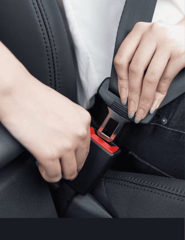 Person putting car seatbelt 