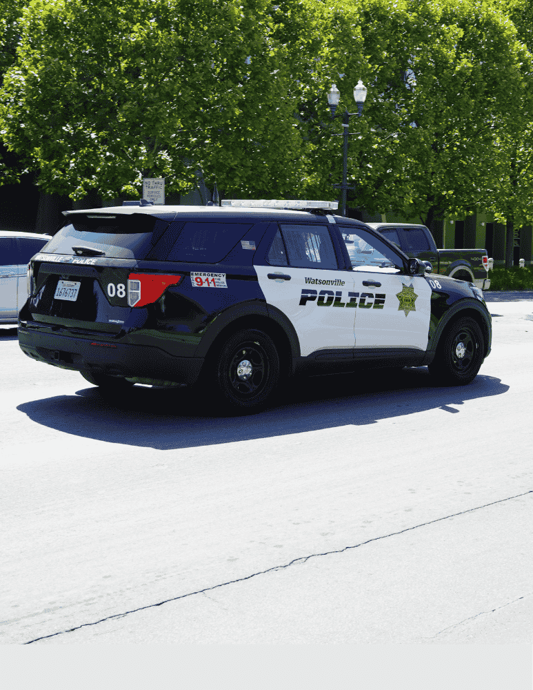 Watsonville patrol car driving on Main Street