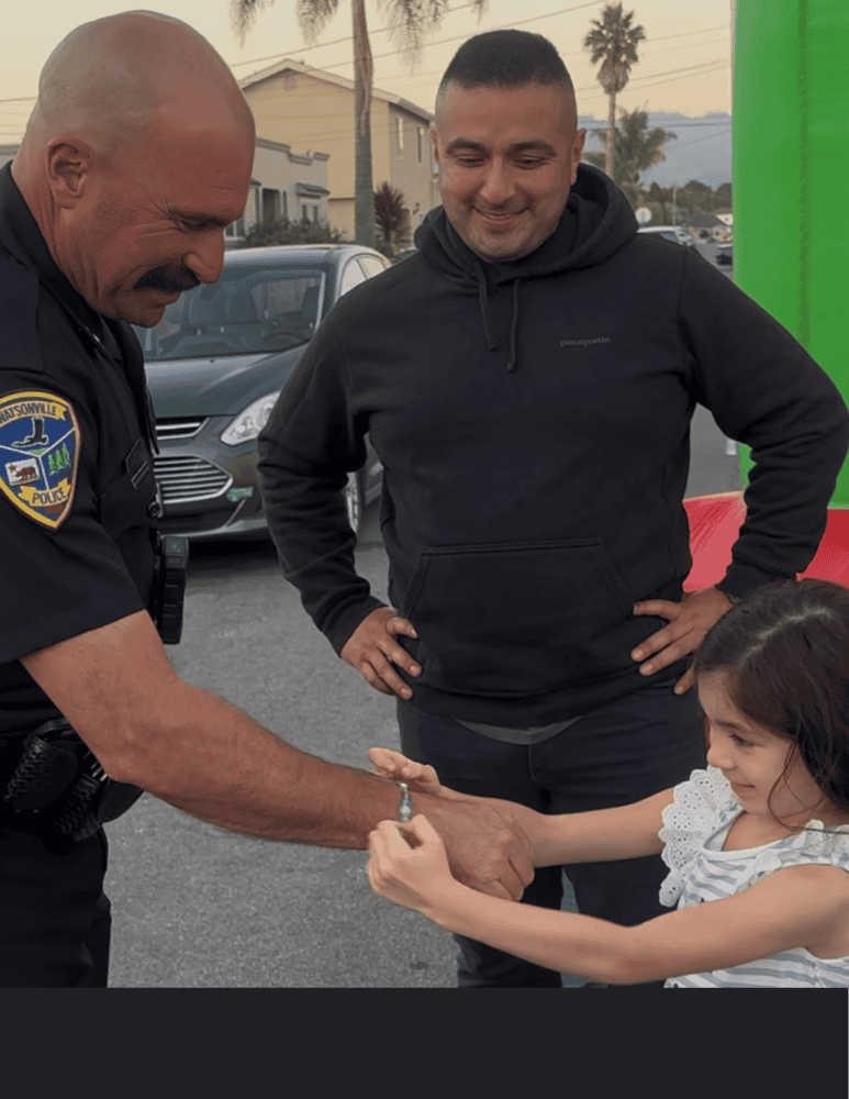 Officer with community members during National Night Out 