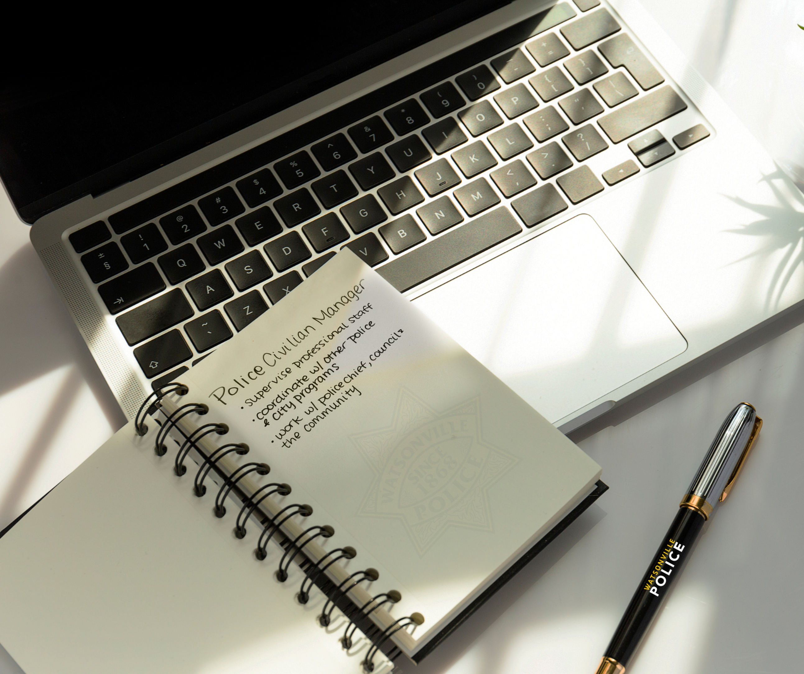 Computer with a notebook with notes about the available position 