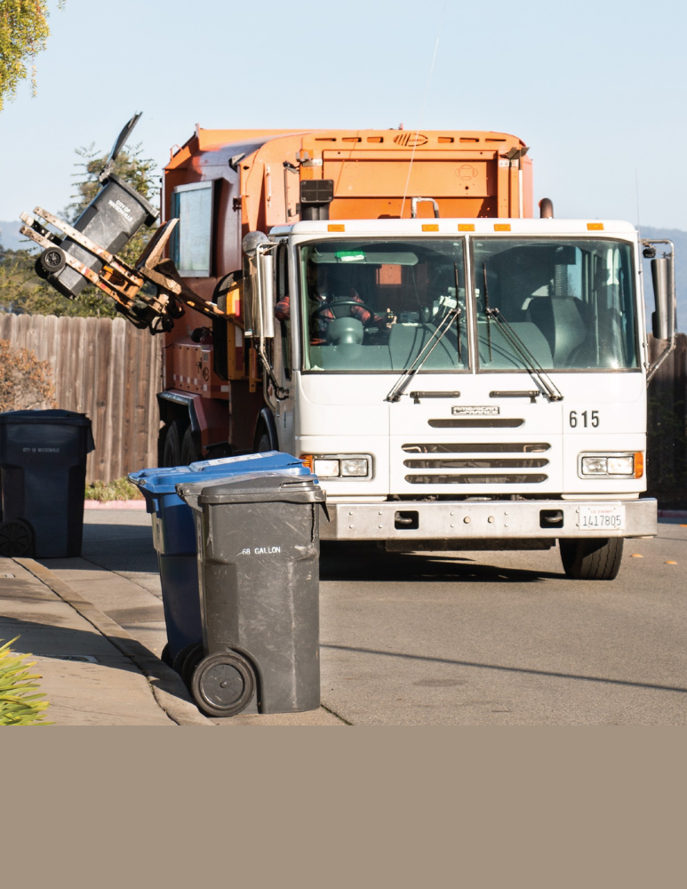 City garbage truck picking up a garbage can 