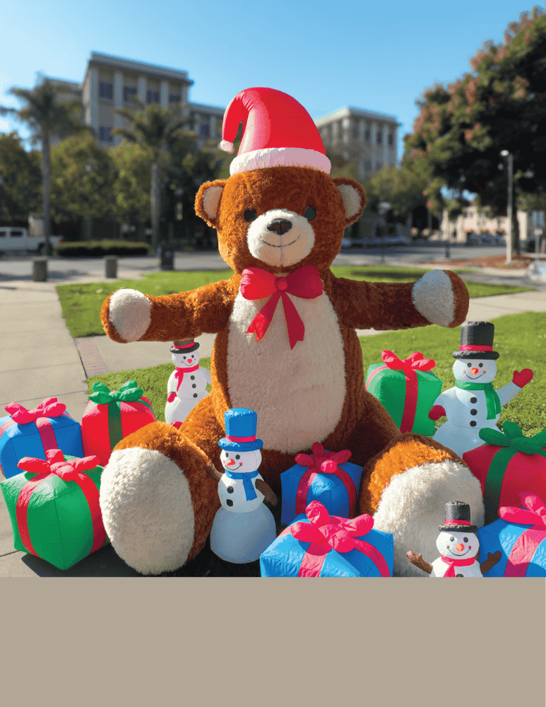 Giant inflatable holiday teddy bear in front of Watsonville Civic Plaza 