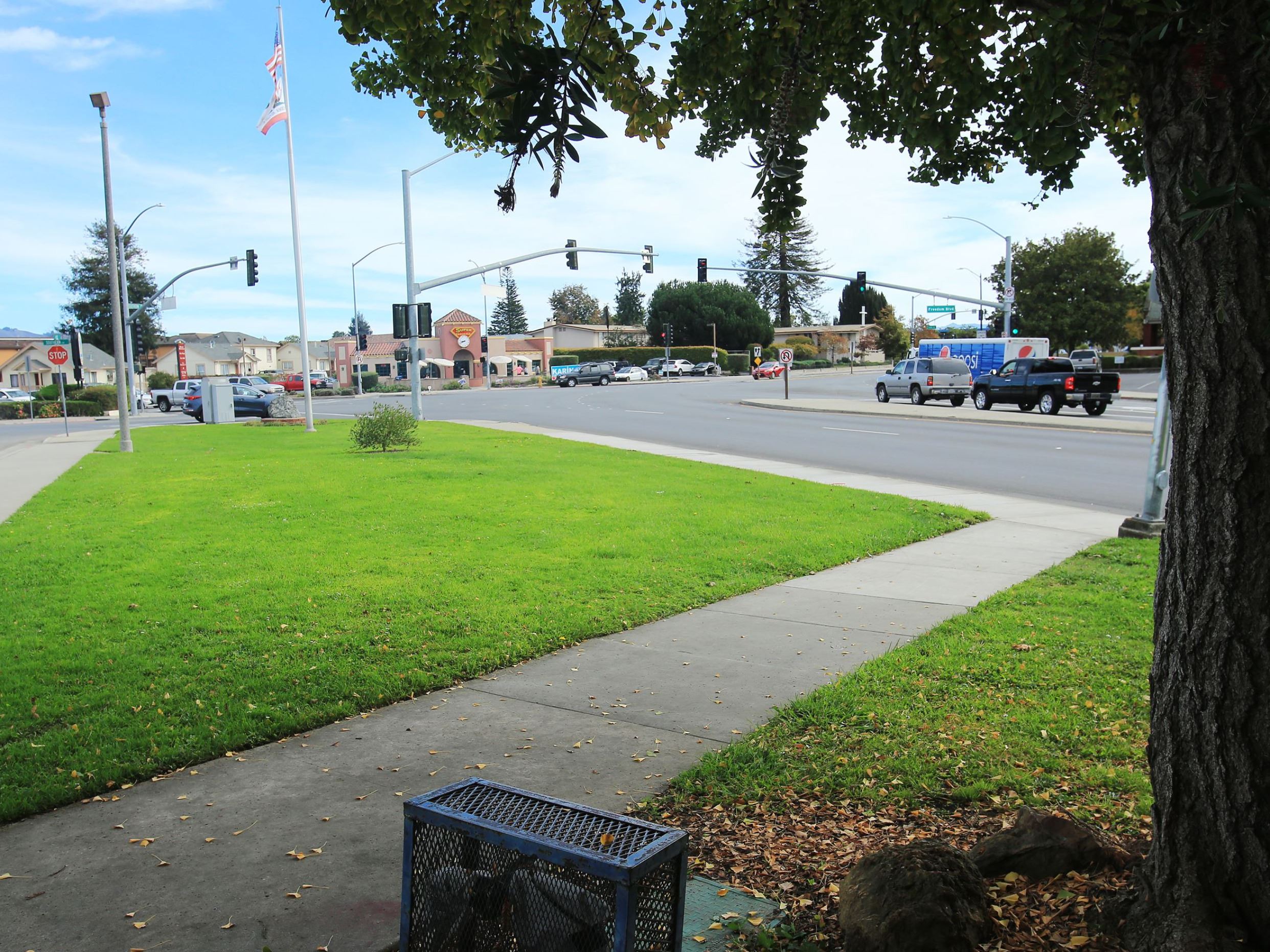 Corner greenspace near intersection at Memorial park