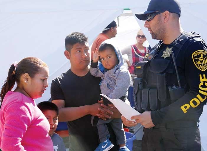 Officer Lopez with residents