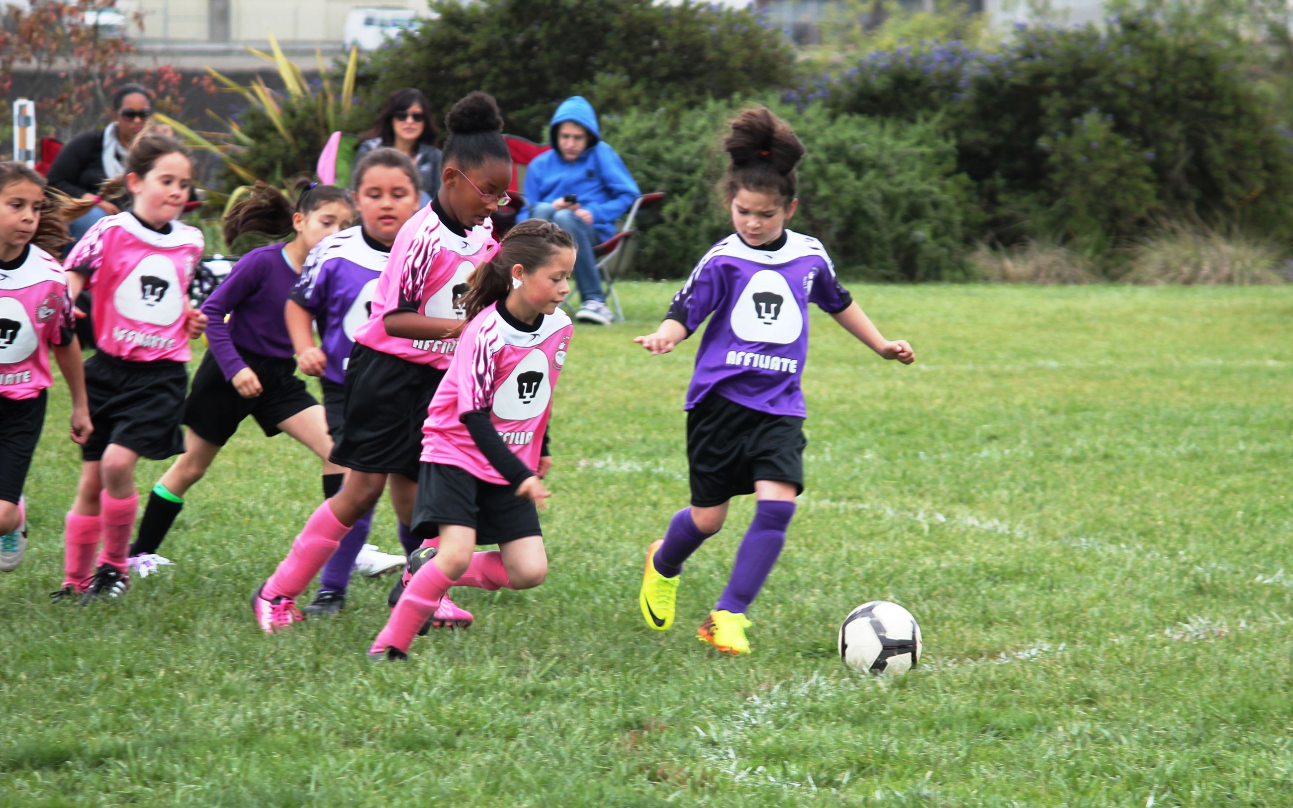 girls playing soccer