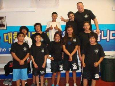 Kids Pose with Police Officer