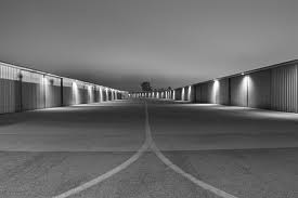 Black and White Photo of Airport Hangers