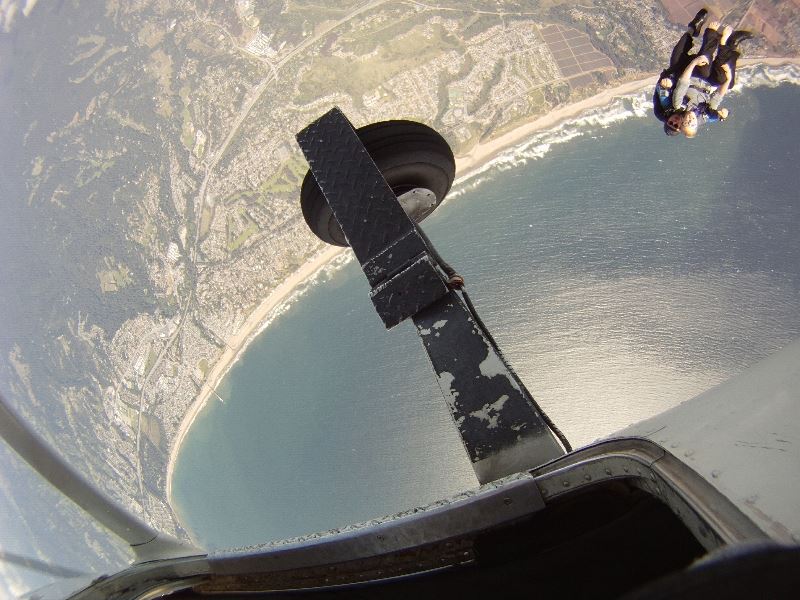 Sky Diver Jumping Out of Airplane